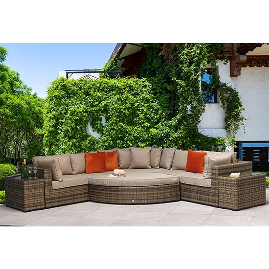 Photo of Jeana corner sofa with poof and end tables in mixed brown