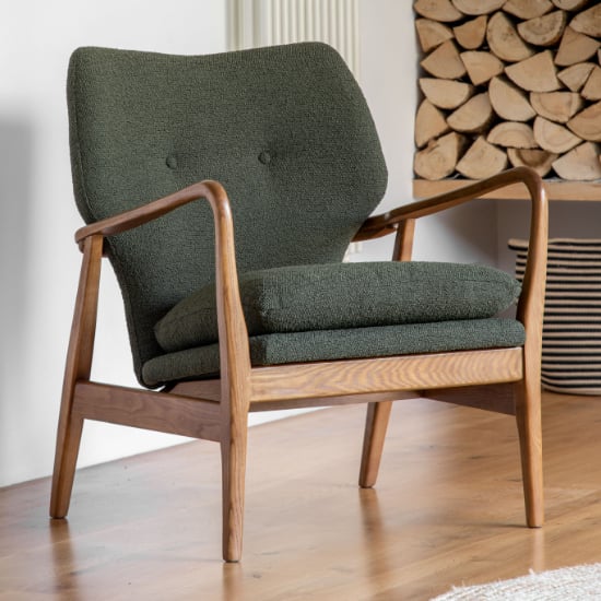 Read more about Jenson fabric armchair with wooden legs in green