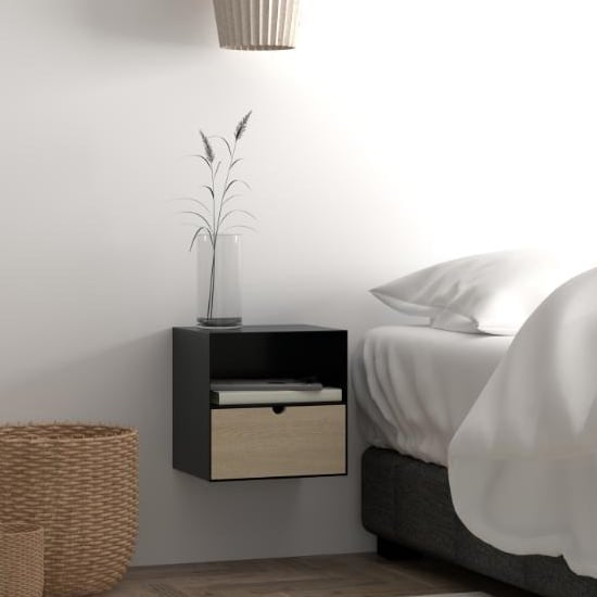 Photo of Jicama wall hung metal bedside cabinet in black and bamboo