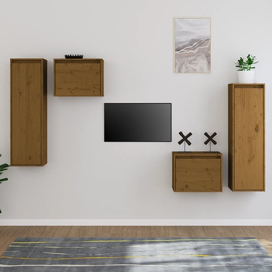 Photo of Kacela solid pinewood entertainment unit in honey brown
