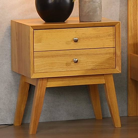 Photo of Kairos solid hardwood bedside cabinet in natural oak