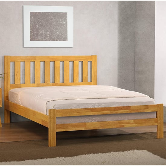 Photo of Kairos solid hardwood king size bed in natural oak