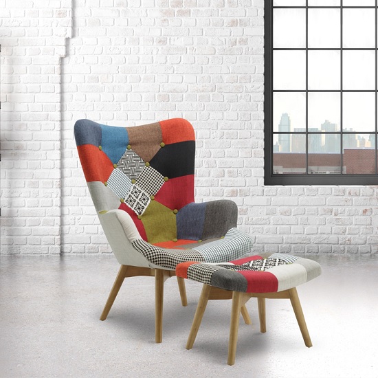 Read more about Kendal arm chair with stool in patched and wooden legs