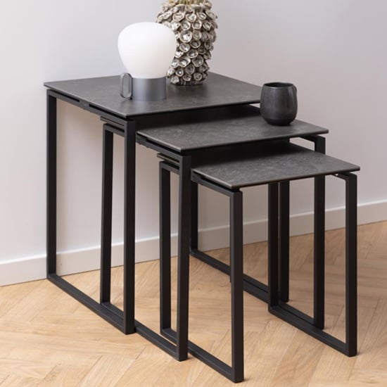 Photo of Kennesaw ceramic nest of 3 tables with metal frame in black