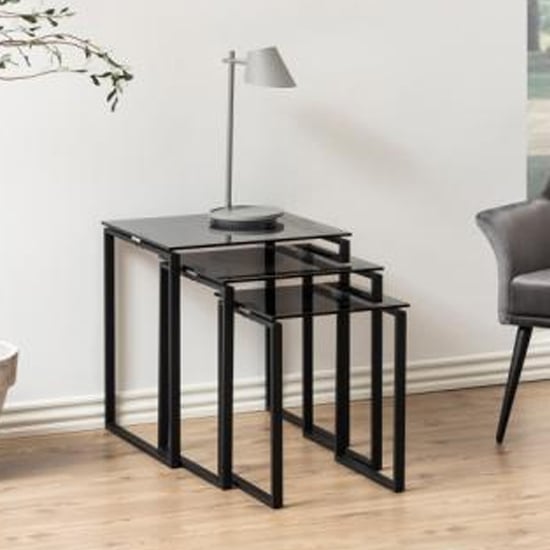 Product photograph of Kennesaw Smoked Glass Nest Of 3 Tables With Matt Black Frame from Furniture in Fashion
