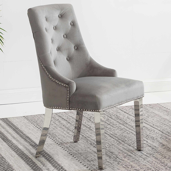 Photo of Kepro knocker back velvet dining chair in light grey