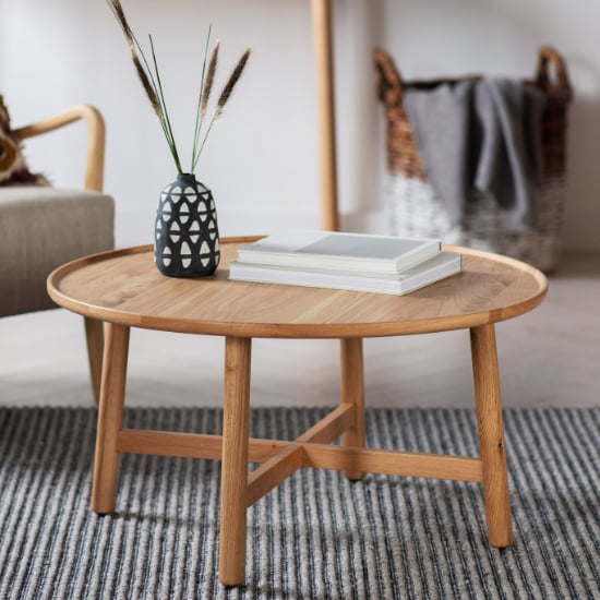 Photo of Kinghamia round wooden coffee table in oak