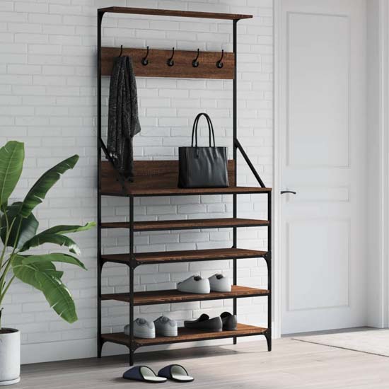 Read more about Kinston wooden clothes rack with shoe storage in brown oak