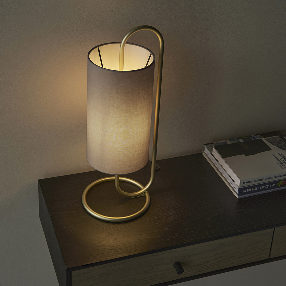 Read more about Kirkland cylindrical grey fabric shade table lamp in brass