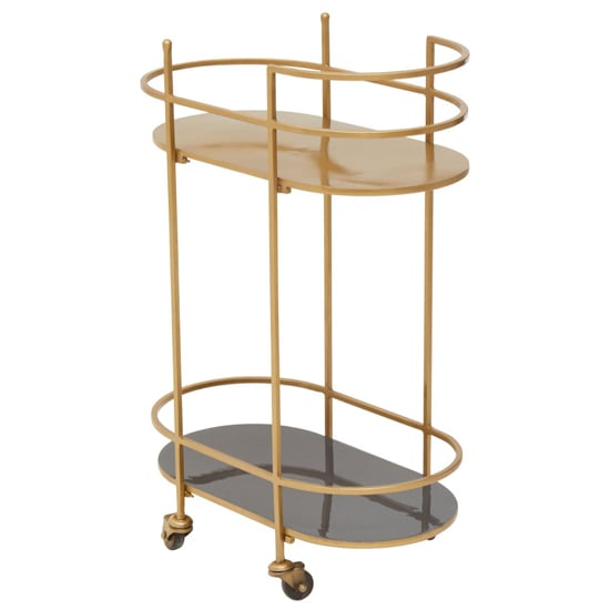 Photo of Koura metal rolling drinks trolley in gold and grey