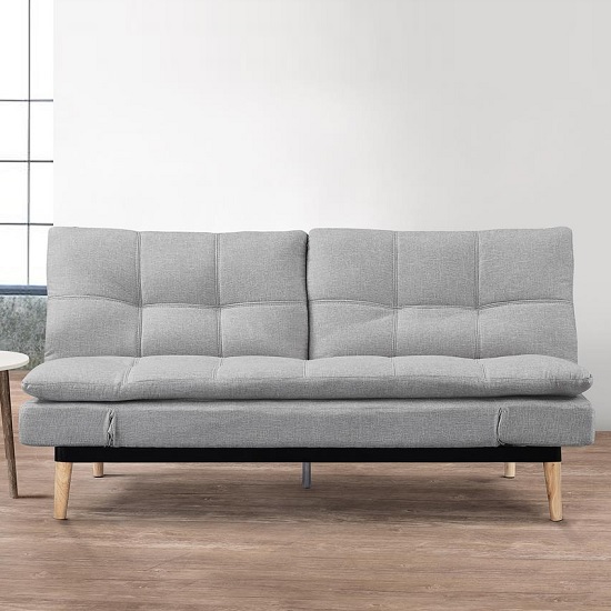 Read more about Krevia faric sofa bed in light stone grey with wooden legs