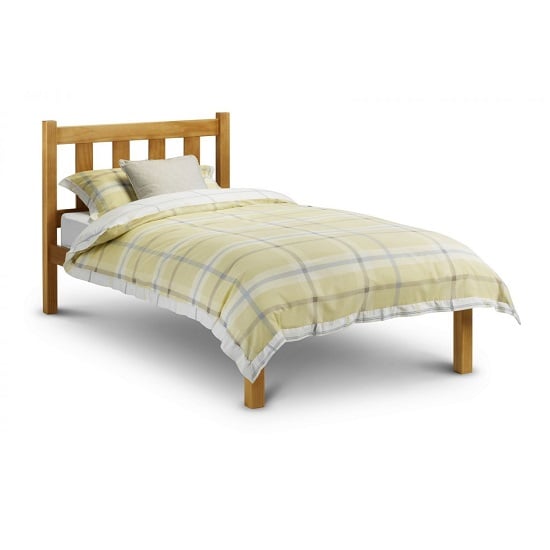 Photo of Paquita wooden single size bed in antique pine lacquer