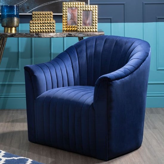 Read more about Larawag upholstered velvet armchair in deep blue