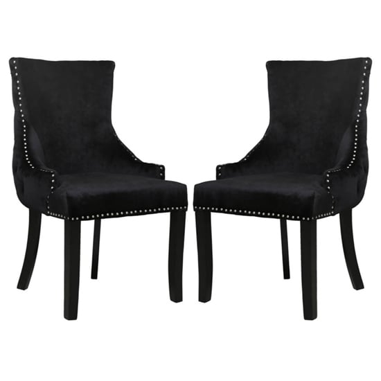 Photo of Laughlin black velvet dining chairs with tufted back in pair