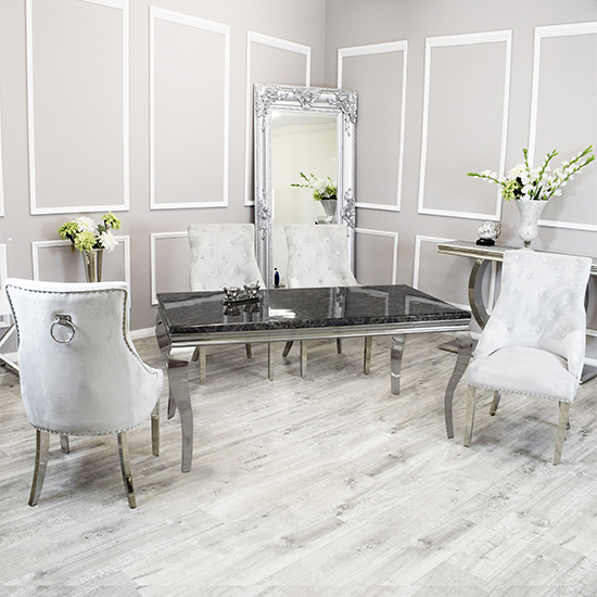 Photo of Laval black marble dining table with 6 dessel light grey chairs