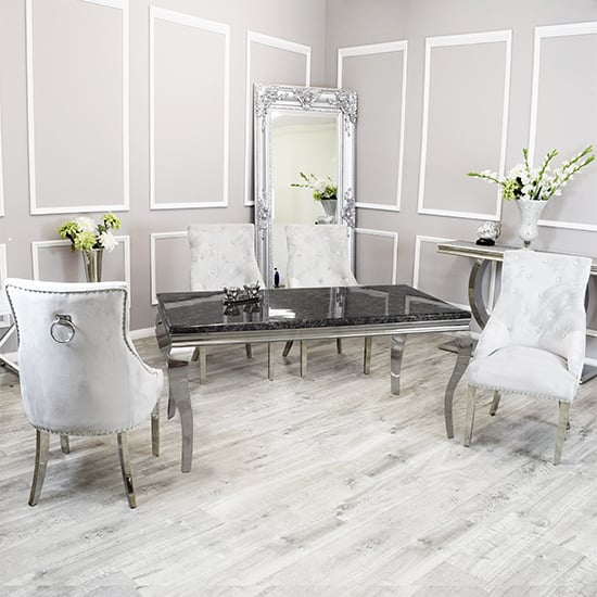 Photo of Laval black marble dining table with 8 dessel light grey chairs