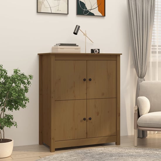 Photo of Laval solid pine wood sideboard with 4 doors in honey brown