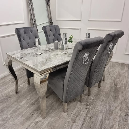 Photo of Laval stomach grey dining table with 8 elmira dark grey chairs