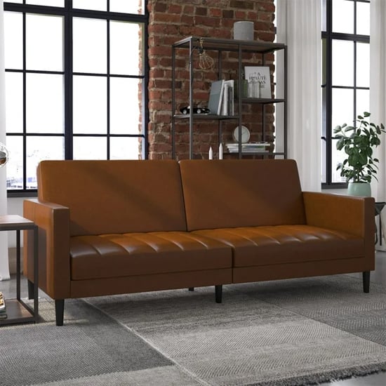 Read more about Leeds faux leather sofa bed with black legs in camel