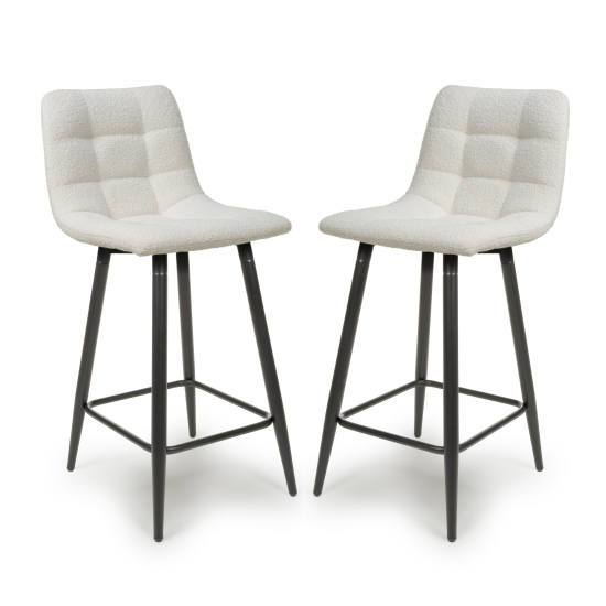 Read more about Lemgo cream fabric bar stools with black legs in pair