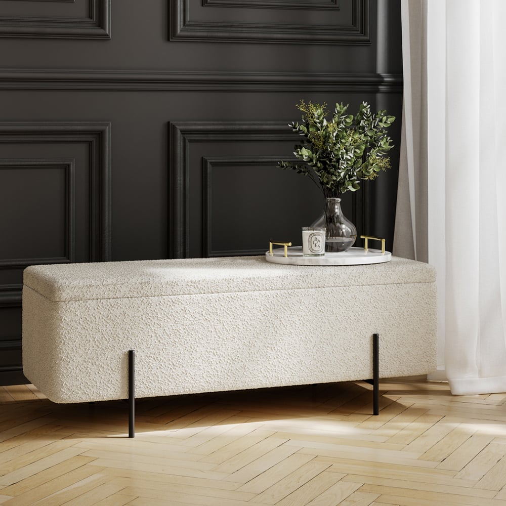 Read more about Lola fabric storage ottoman with black legs in ivory