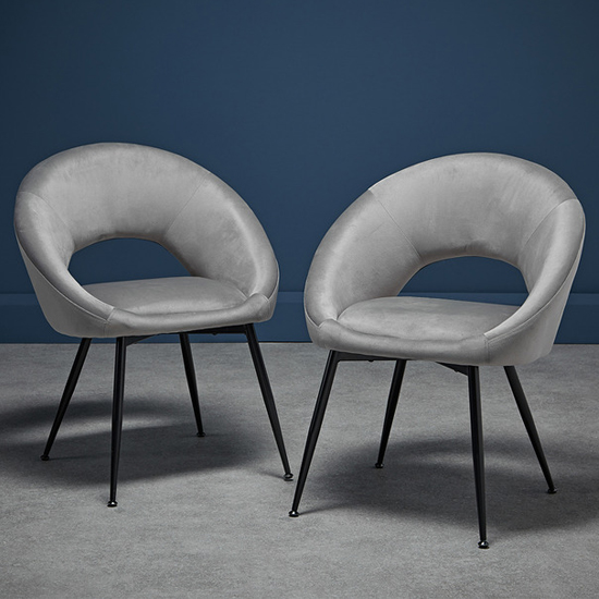 Read more about Lolo grey velvet dining chairs with black legs in pair