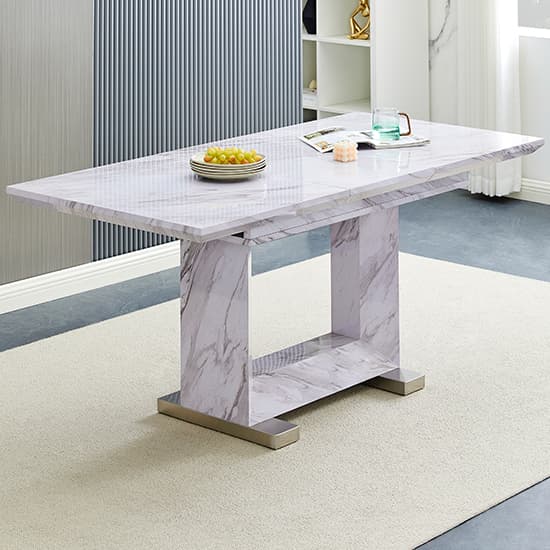 Photo of Lorence extendable wooden dining table in grey marble effect