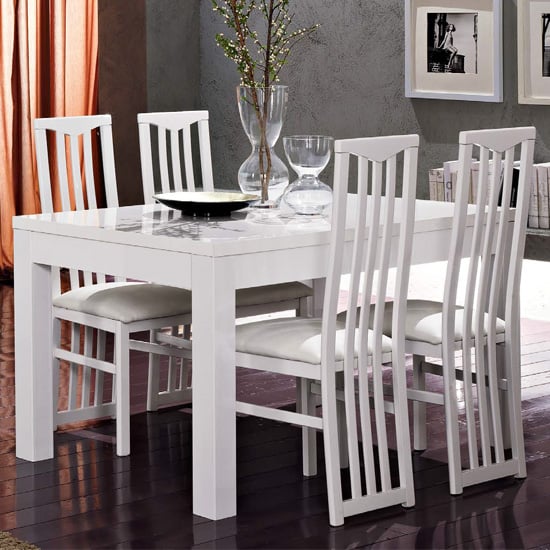 Photo of Lorenz dining table in gloss white with 4 white cexa chairs