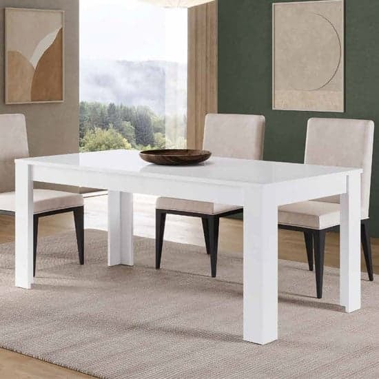 Read more about Lorenz wooden dining table in white high gloss