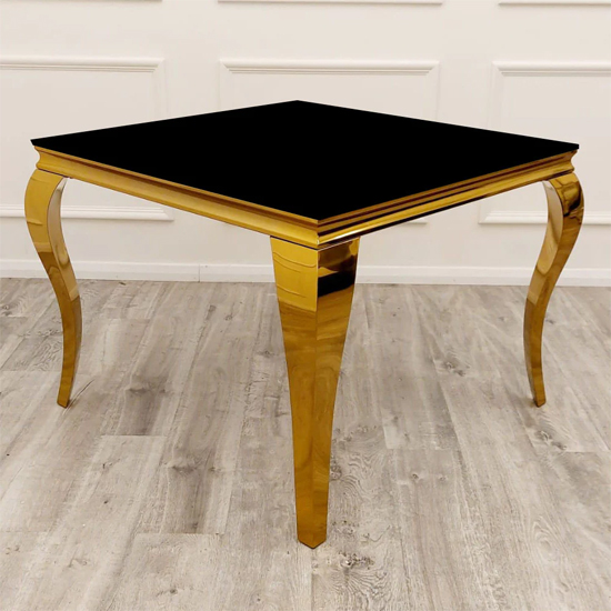 Photo of Laval square black glass dining table with gold curved legs