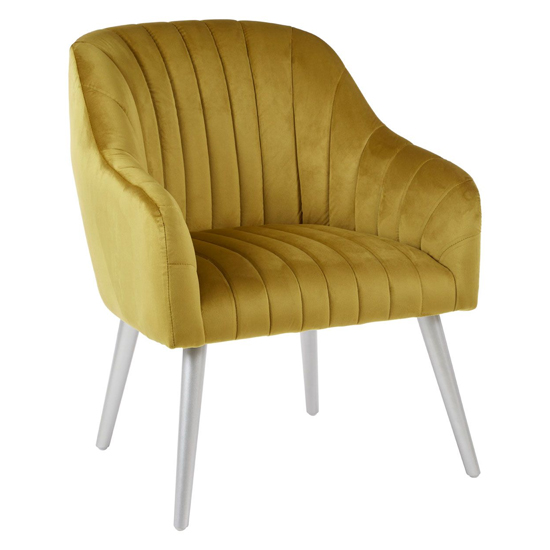 Read more about Luxury upholstered velvet armchair with silver legs in mustard