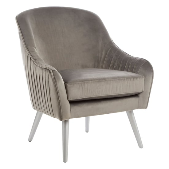 Photo of Luxury upholstered velvet armchair with wooden legs in grey