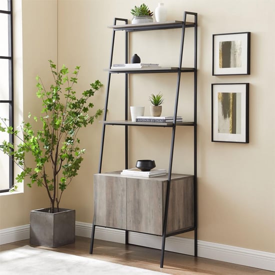 Photo of Lynn industrial modern ladder bookcase with cabinet in grey
