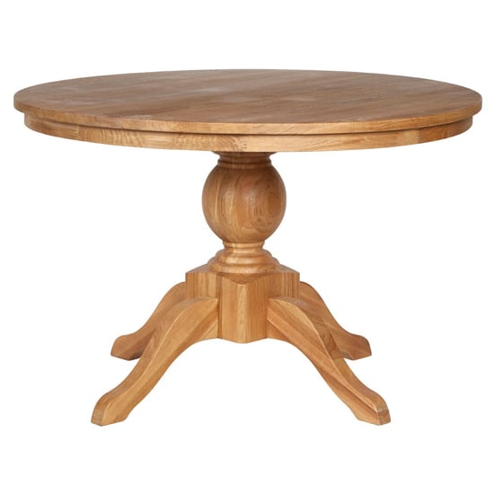 Photo of Lyox round wooden weathered dining table in natural