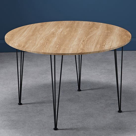 Read more about Lyza round wooden dining table in oak effect