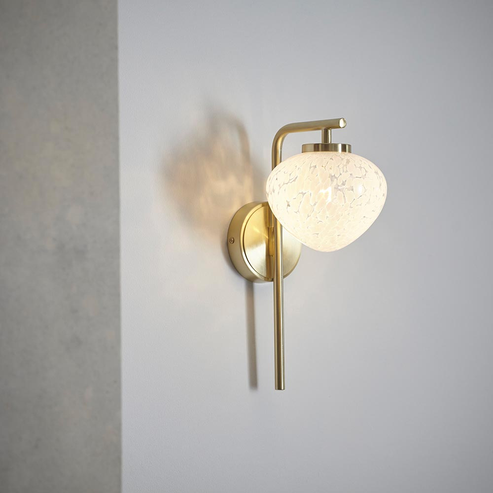 Read more about Mackay white confetti glass wall light in satin brass