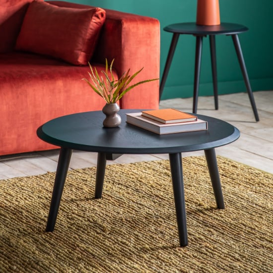Photo of Maddux round wooden coffee table in black