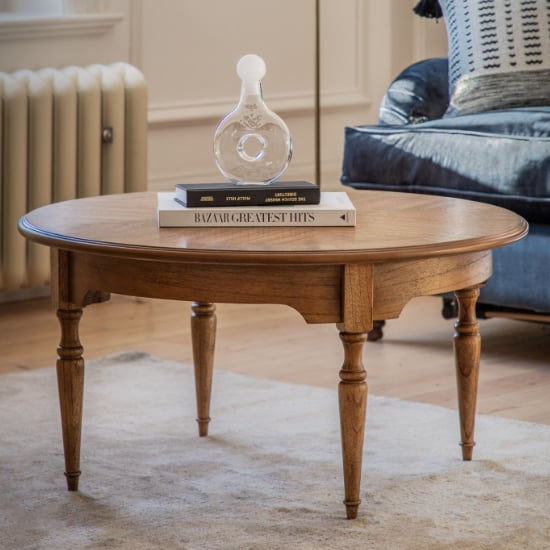 Photo of Madisen round wooden coffee table in peroba