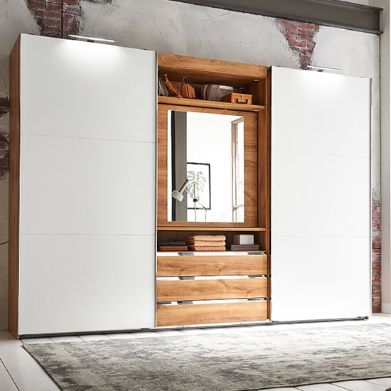 Read more about Magic mirrored sliding wardrobe in planked oak with tv shelf