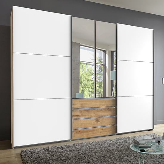 Read more about Magic mirrored wooden sliding door wide wardrobe in planked oak