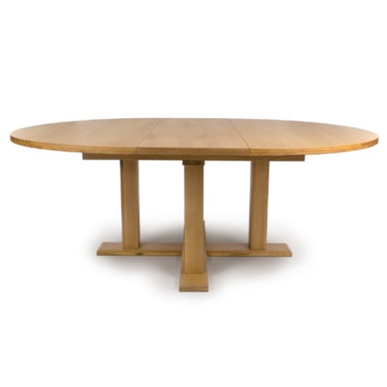 Read more about Magna round extending wooden dining table in oak
