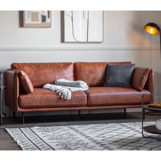 Photo of Magnolia leather 3 seater sofa in brown with metal legs