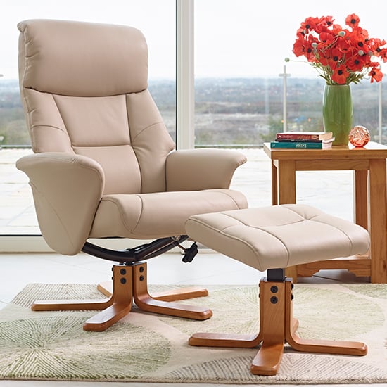 Photo of Maida leather swivel recliner chair and footstool in cafe latte