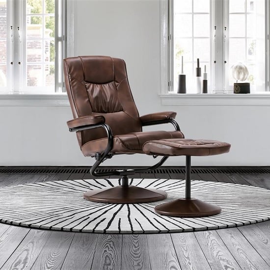 Photo of Maison relaxing swivel chair with footstool in tan faux leather