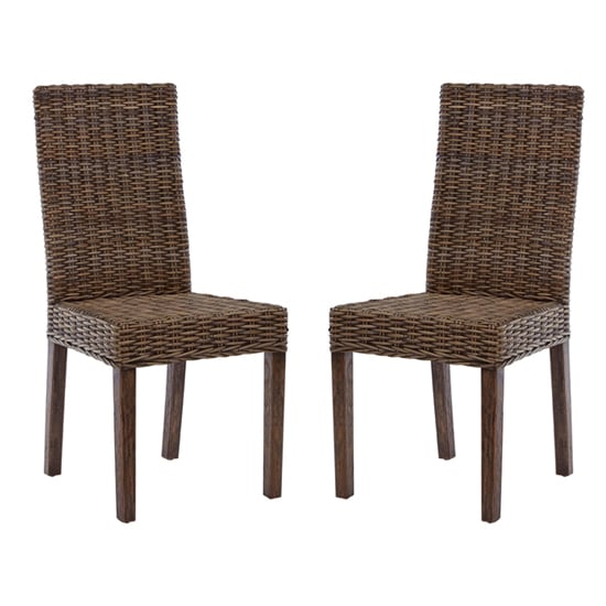 Photo of Helvetios brown kubu rattan dining chairs in a pair