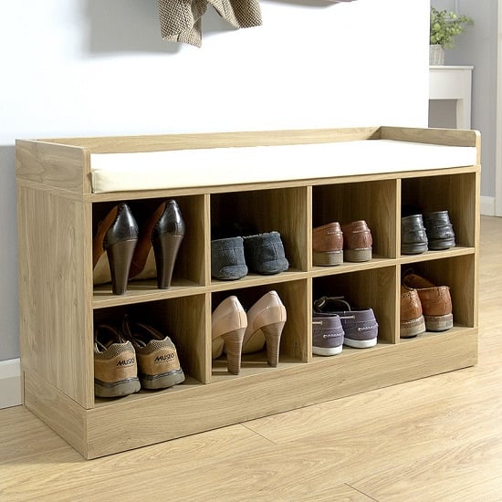 Photo of Keswick shoe bench in oak with eight open compartments