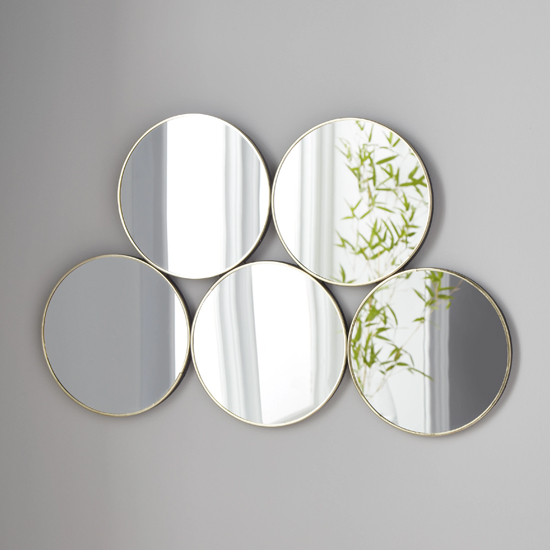 Photo of Manhattan 5 circles wall mirror in gold metal frame