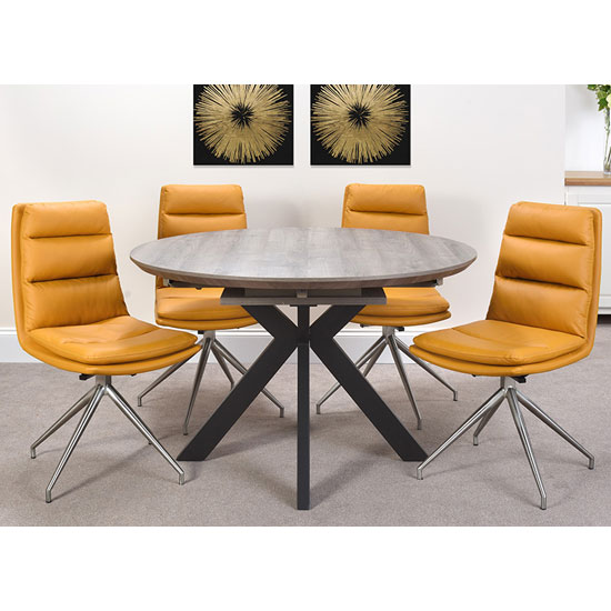 Read more about Manhattan extending round dining set with 4 ochre nobo chairs