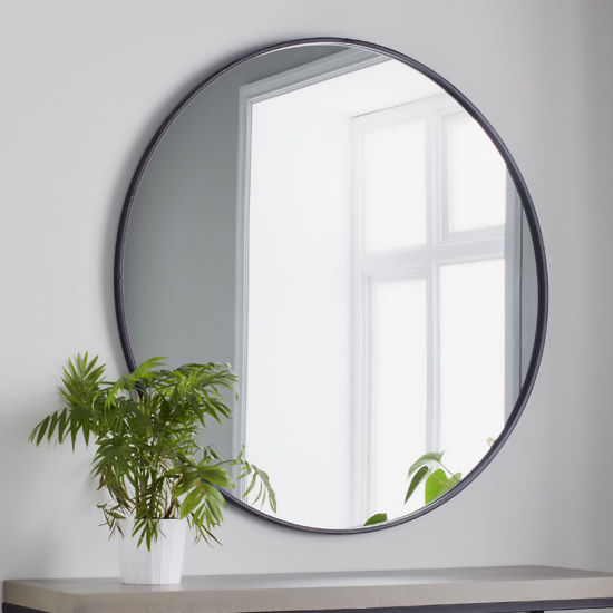 Read more about Manhattan large round wall mirror in black metal frame