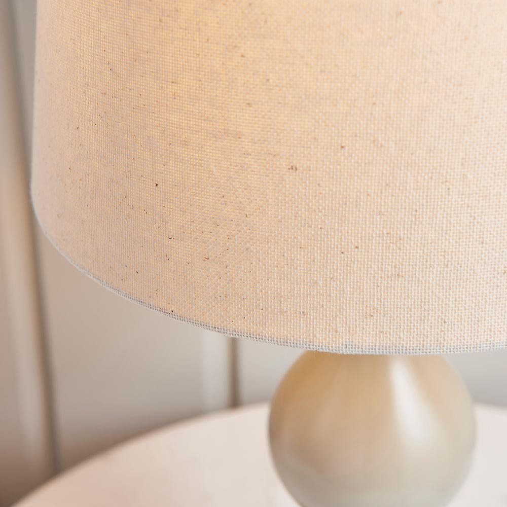Manteo Ivory Fabric Shade Table Lamp With Taupe Wooden Base